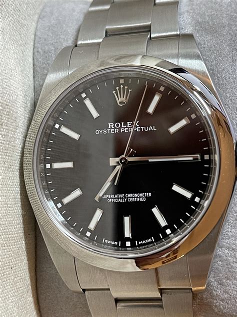 rolex oyster perpetual 39mm black dial